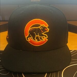 New Era Black Hat with Red and Yellow Logo